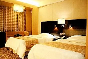 Imagen de la habitación del Hotel Beidahuang International. Foto 12