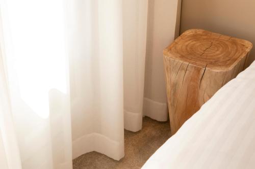 Imagen de la habitación del Hotel Beige. Foto 11