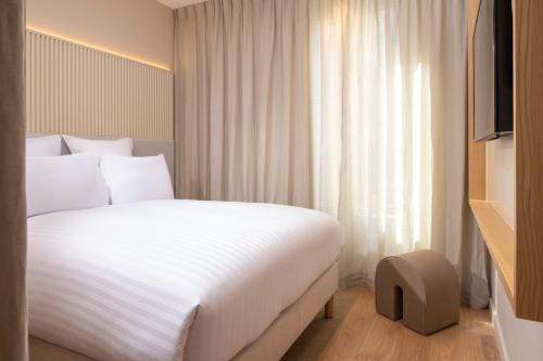 Imagen de la habitación del Hotel Beige. Foto 12