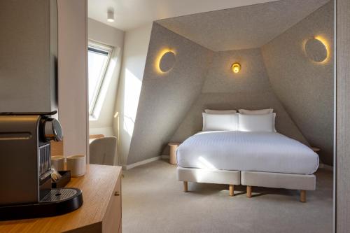 Imagen de la habitación del Hotel Beige. Foto 13