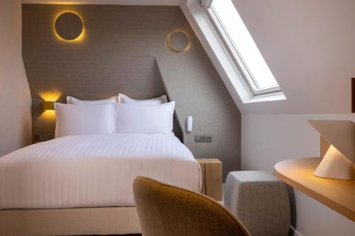 Imagen de la habitación del Hotel Beige. Foto 14