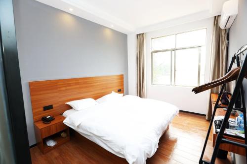 Imagen de la habitación del Hotel Beihai Kuaike. Foto 6