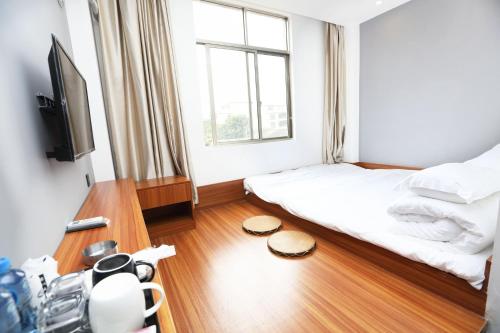Imagen de la habitación del Hotel Beihai Kuaike. Foto 8