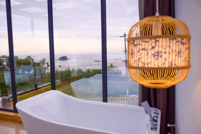 Imagen de la habitación del Hotel Beihai Weizhoudao 21 Haili. Foto 8