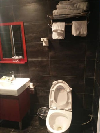 Imagen de la habitación del Hotel Beijing 123 Holiday. Foto 5