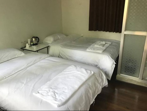 Imagen de la habitación del Hotel Beijing 123 Holiday. Foto 6