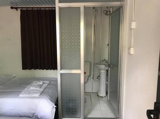 Imagen de la habitación del Hotel Beijing 123 Holiday. Foto 9