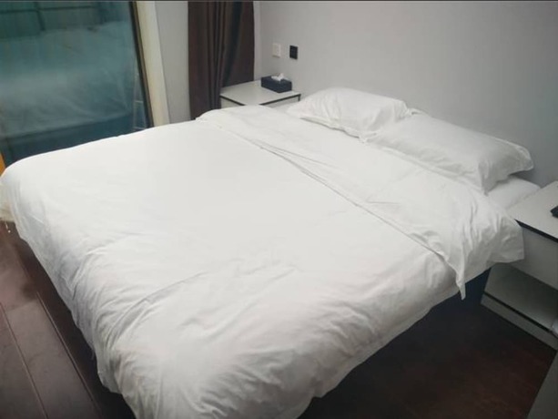 Imagen de la habitación del Hotel Beijing 123 Holiday. Foto 10