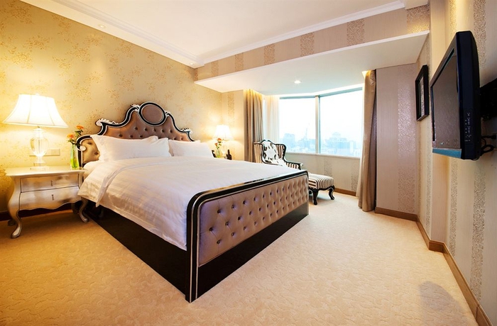 Imagen de la habitación del Hotel Beijing Asia. Foto 3