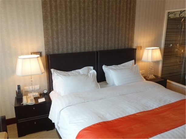 Imagen de la habitación del Hotel Beijing Asia. Foto 6