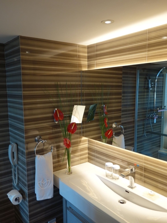 Imagen de la habitación del Hotel Beijing Asia. Foto 8