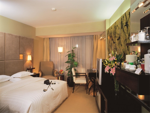 Imagen de la habitación del Hotel Beijing Asia. Foto 9