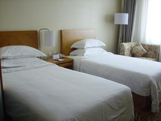 Imagen de la habitación del Hotel Beijing Ausotel Dayu. Foto 4