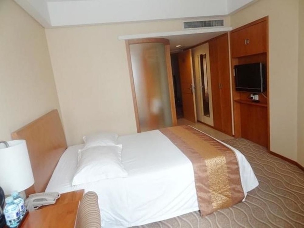 Imagen de la habitación del Hotel Beijing Ausotel Dayu. Foto 5