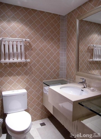 Imagen de la habitación del Hotel Beijing Ausotel Dayu. Foto 6