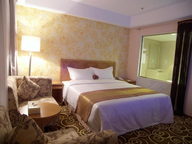 Imagen de la habitación del Hotel Beijing Ausotel Dayu. Foto 7