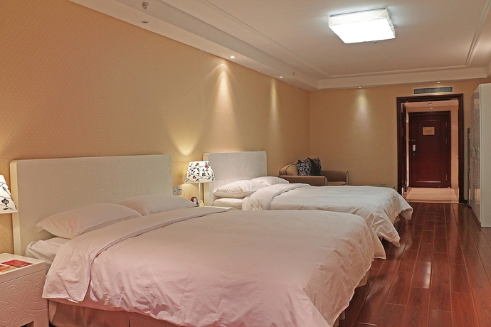 Imagen de la habitación del Hotel Beijing Baifuyi Apartment Dongzhimen. Foto 11