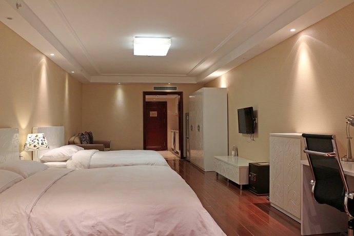 Imagen de la habitación del Hotel Beijing Baifuyi Apartment Dongzhimen. Foto 14