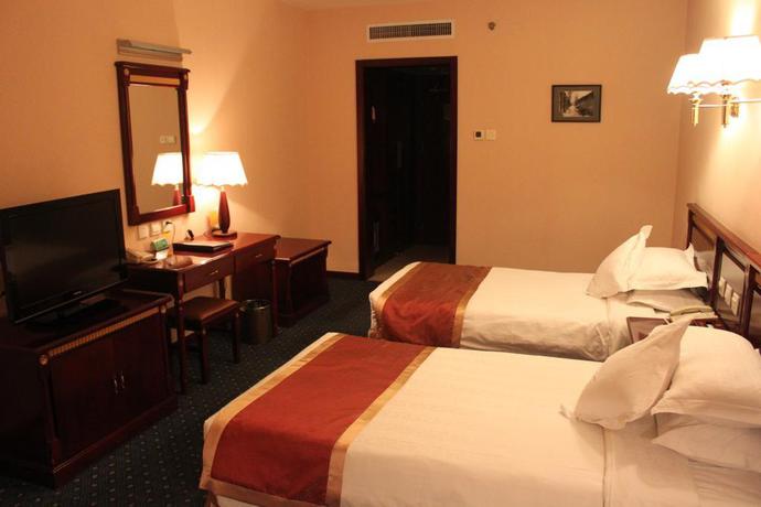 Imagen de la habitación del Hotel Beijing Commercial Business Hotel. Foto 8