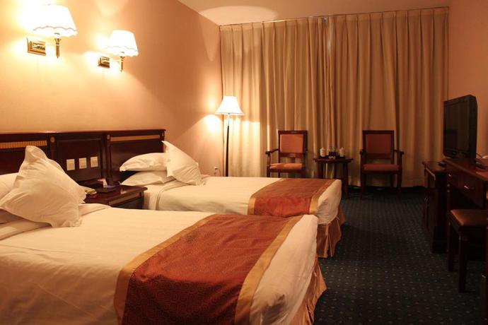 Imagen de la habitación del Hotel Beijing Commercial Business Hotel. Foto 9