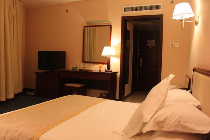 Imagen de la habitación del Hotel Beijing Commercial Business Hotel. Foto 11