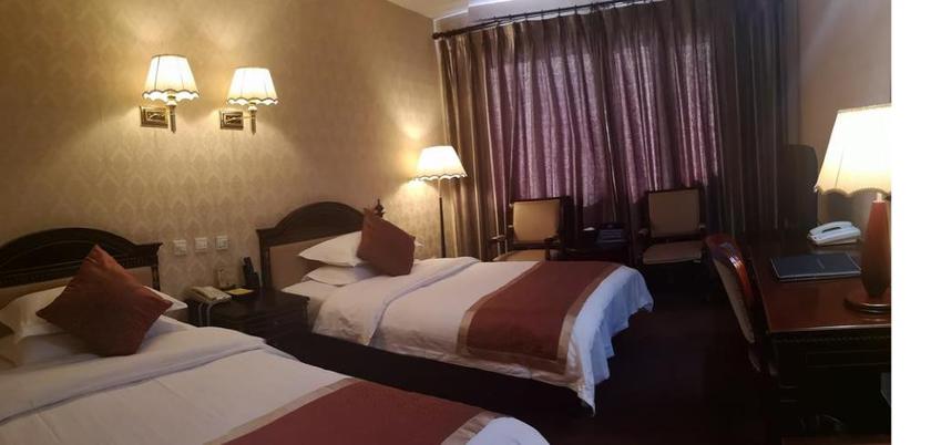 Imagen de la habitación del Hotel Beijing Commercial Business Hotel. Foto 17