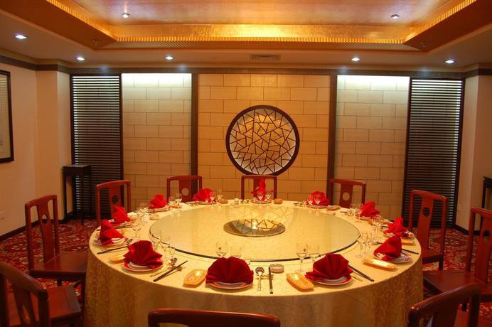 Imagen del bar/restaurante del Hotel Beijing Commercial Business Hotel. Foto 7