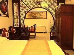 Imagen de la habitación del Hotel Beijing Courtyard View Hotel. Foto 4
