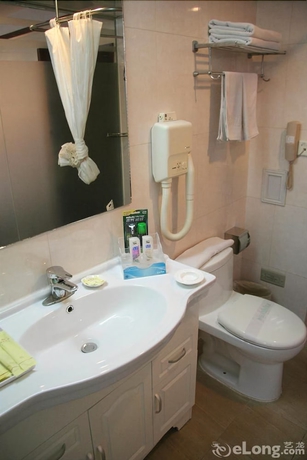 Imagen de la habitación del Hotel Beijing Desheng. Foto 5