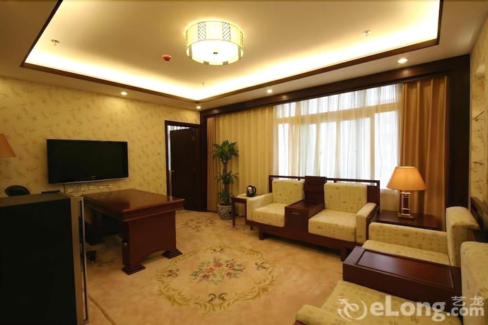 Imagen de la habitación del Hotel Beijing Desheng. Foto 12