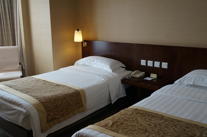 Imagen de la habitación del Hotel Beijing Dongfang. Foto 7