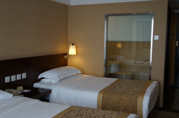 Imagen de la habitación del Hotel Beijing Dongfang. Foto 14