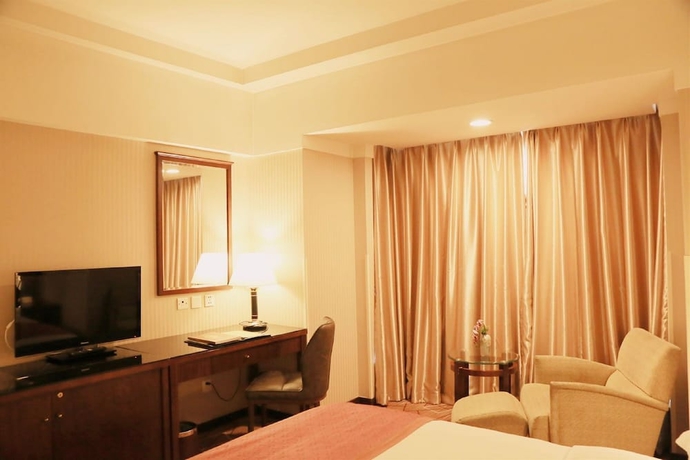 Imagen de la habitación del Hotel Beijing Dongfang. Foto 18