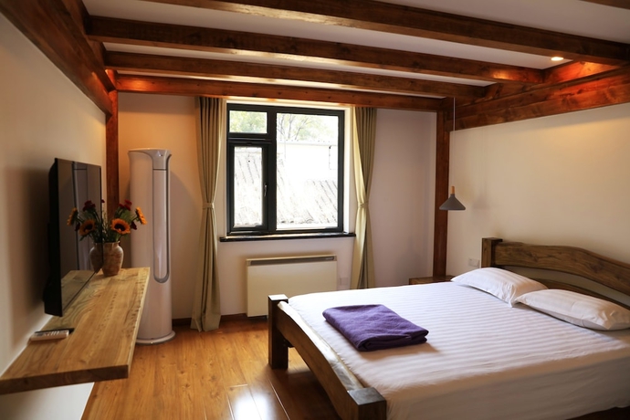 Imagen de la habitación del Hotel Beijing Downtown Travelotel. Foto 2