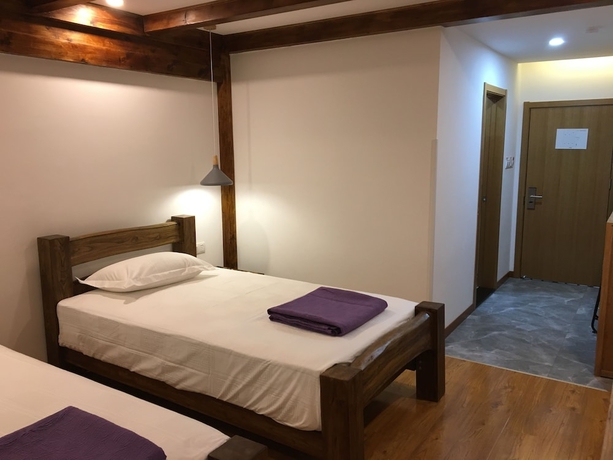 Imagen de la habitación del Hotel Beijing Downtown Travelotel. Foto 7