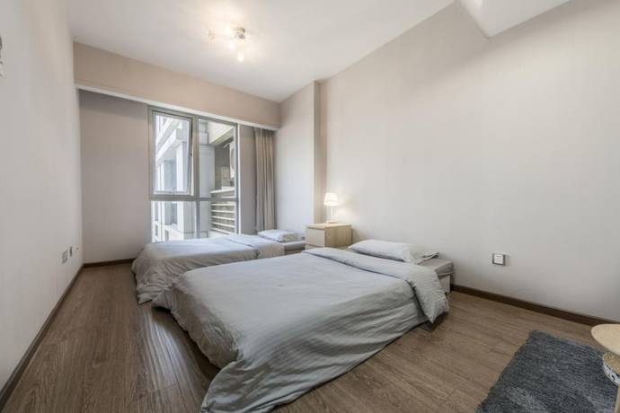 Imagen de la habitación del Hotel Beijing Eastern GINZA. Foto 11