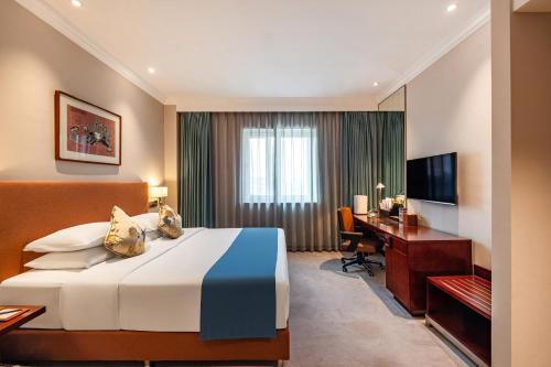 Imagen de la habitación del Hotel Beijing Feitian. Foto 2