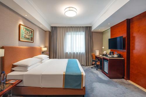 Imagen de la habitación del Hotel Beijing Feitian. Foto 4