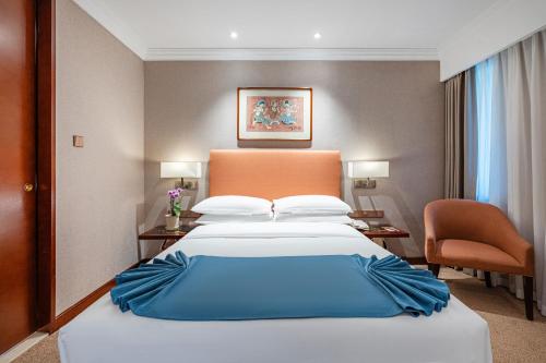 Imagen de la habitación del Hotel Beijing Feitian. Foto 5