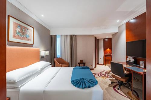 Imagen de la habitación del Hotel Beijing Feitian. Foto 6