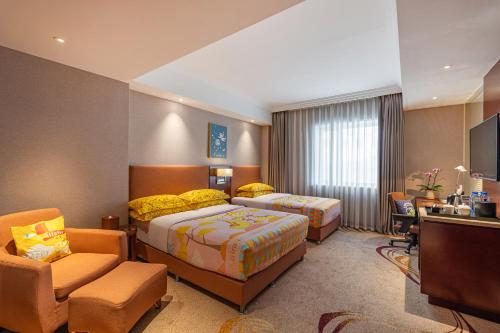 Imagen de la habitación del Hotel Beijing Feitian. Foto 8