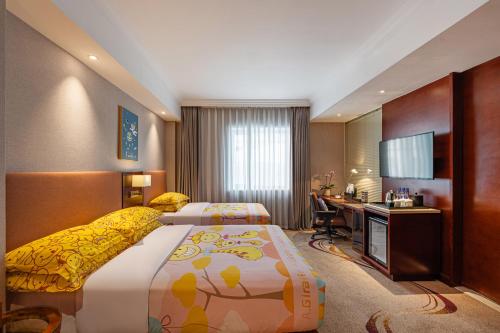 Imagen de la habitación del Hotel Beijing Feitian. Foto 9