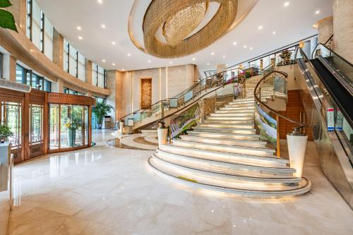 Imagen de los interiores del Hotel Beijing Feitian. Foto 12