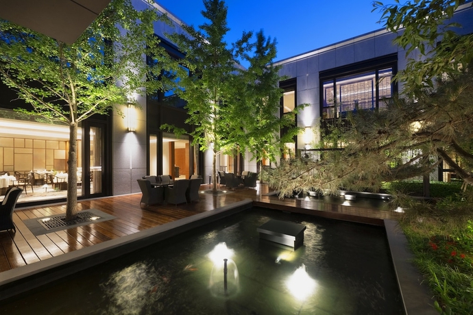 Imagen de los exteriores del Hotel Beijing Fortune Grove. Foto 13