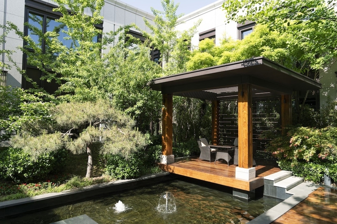 Imagen de los exteriores del Hotel Beijing Fortune Grove. Foto 14