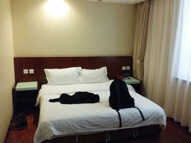 Imagen de la habitación del Hotel Beijing Fuyoujie Hotel. Foto 3