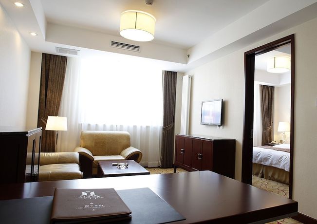 Imagen de la habitación del Hotel Beijing Fuyoujie Hotel. Foto 4