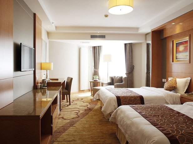Imagen de la habitación del Hotel Beijing Fuyoujie Hotel. Foto 5