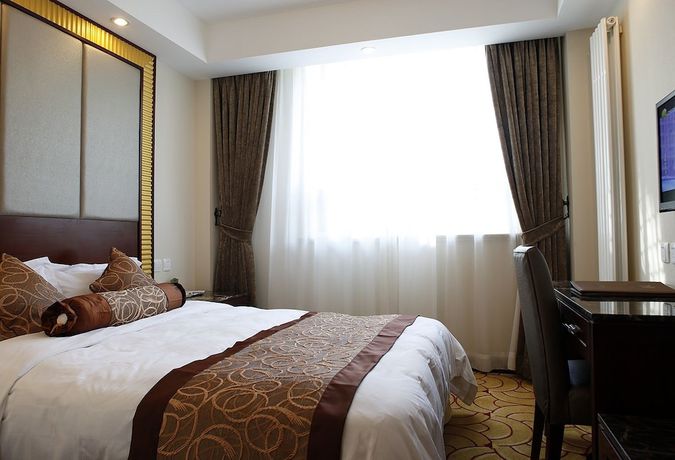 Imagen de la habitación del Hotel Beijing Fuyoujie Hotel. Foto 7