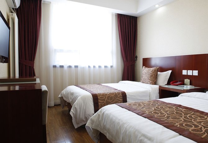 Imagen de la habitación del Hotel Beijing Fuyoujie Hotel. Foto 8